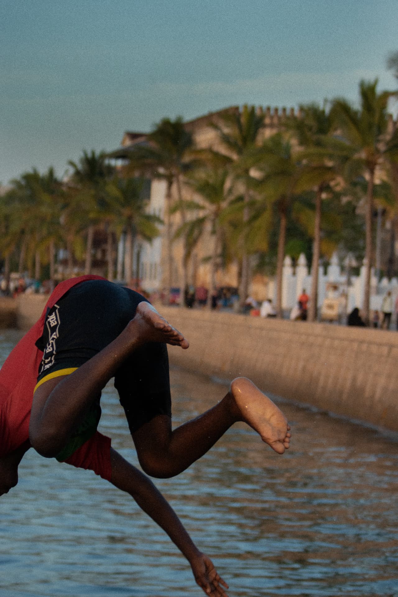 Still — figure leaping into the water