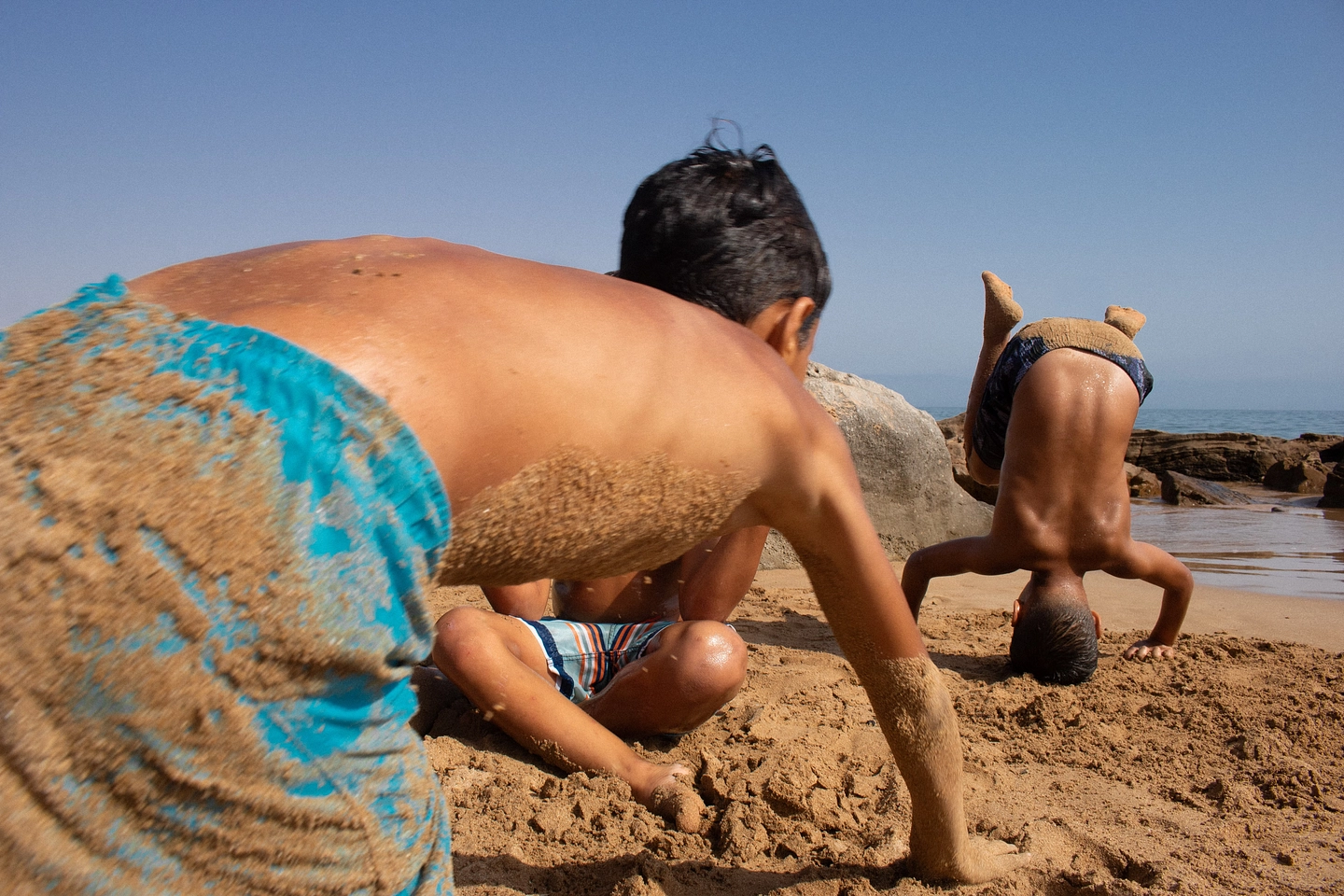 Still — children playing on the beach