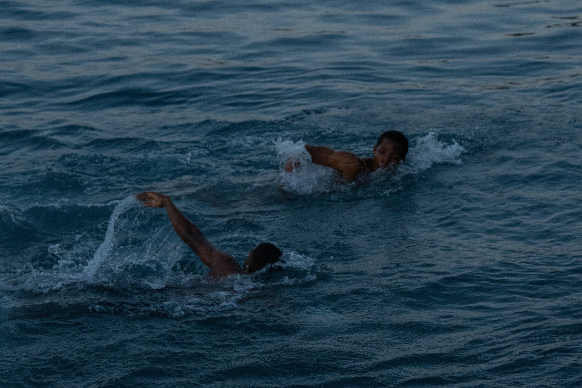 Still — swimmers at sea
